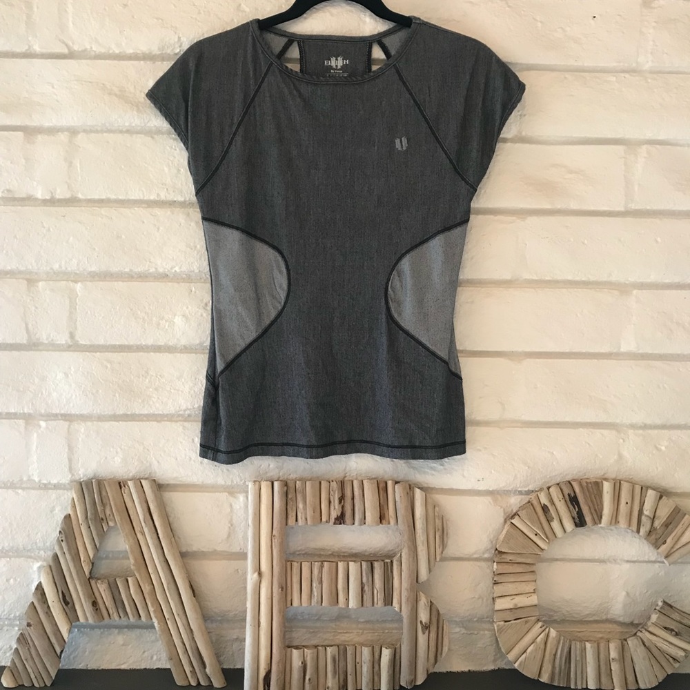 Eleven short sleeve athletic top.